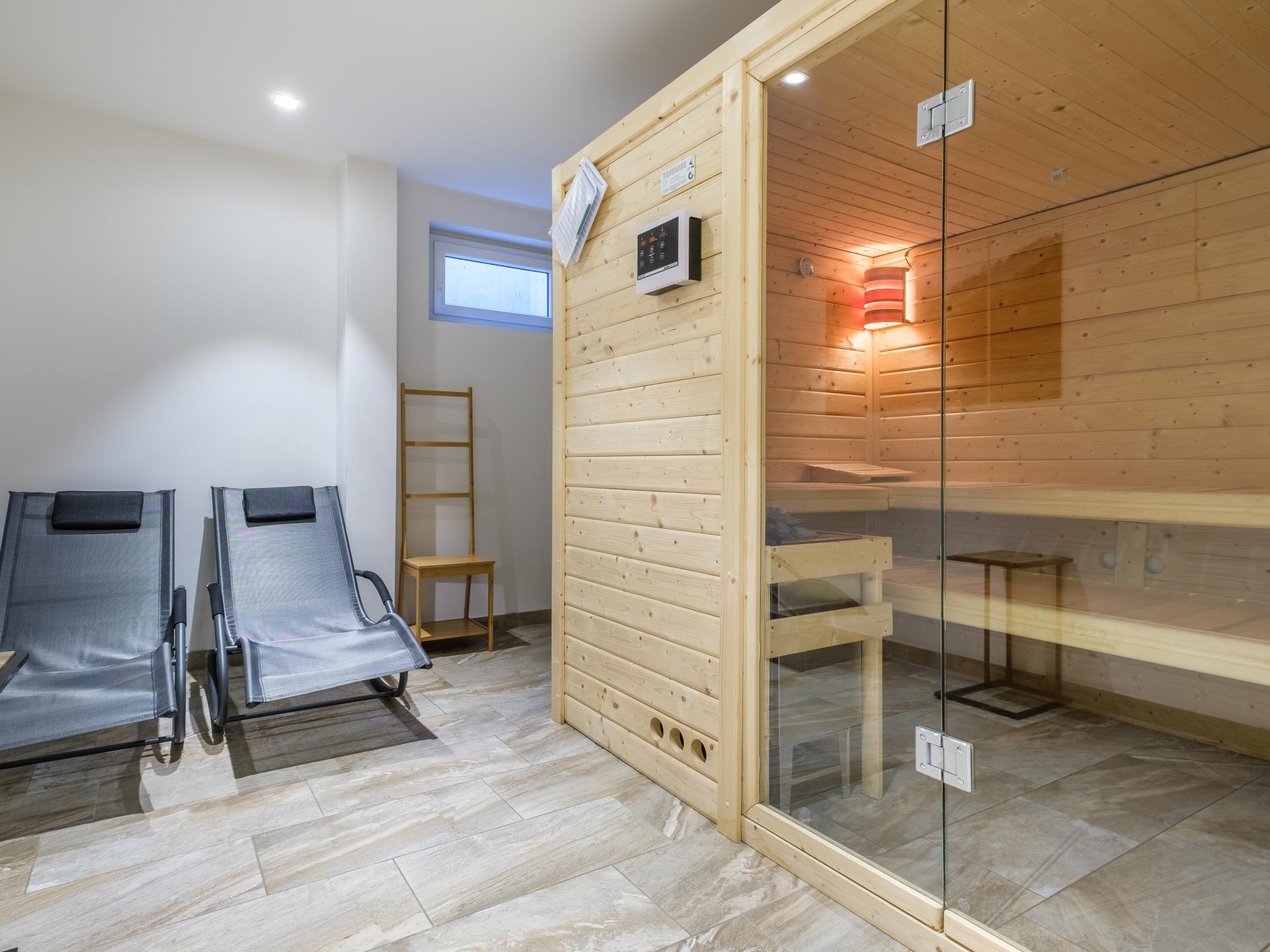 Ruim en luxe appartement met sauna, nabij skilift